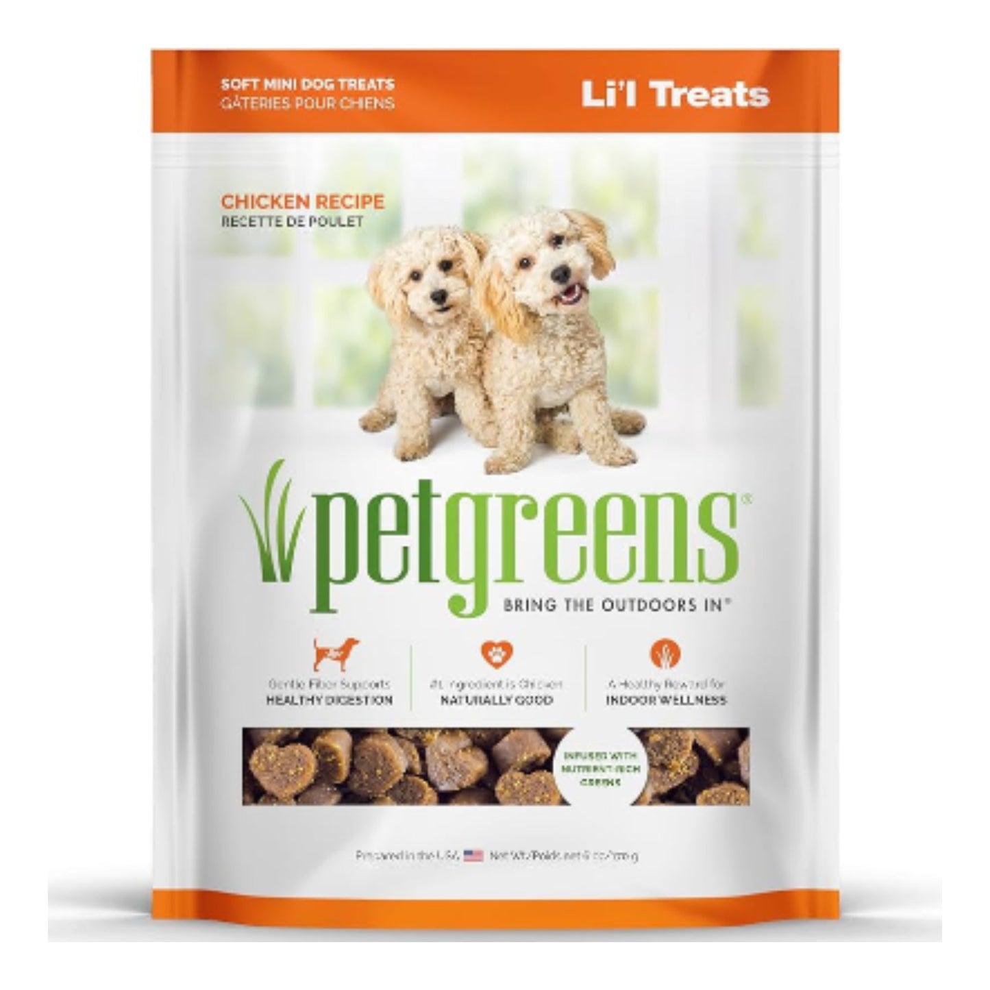 Pet greens dog treats packaging with two puppies on a white background